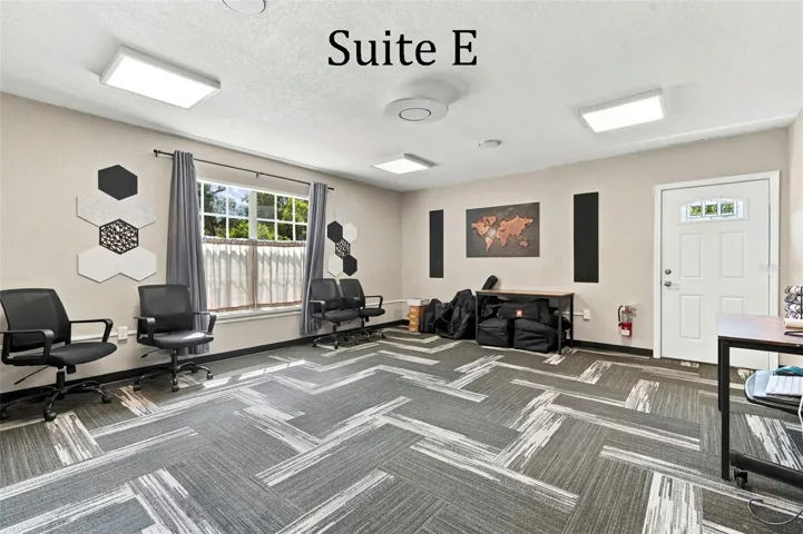 Suite E has a private entrance, large window overlooking the landscaping, a private restroom and has access to the Covered Patio Break Area