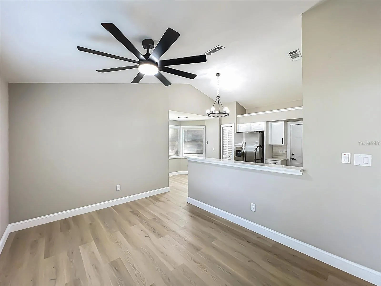 View from dining room area toward kitchen and dinette.