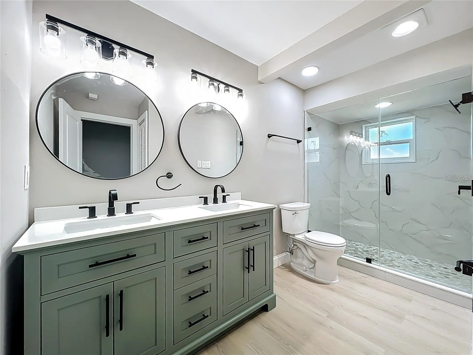 View of primary bathroom from entrance.