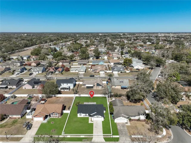 Aerial view of property and community.