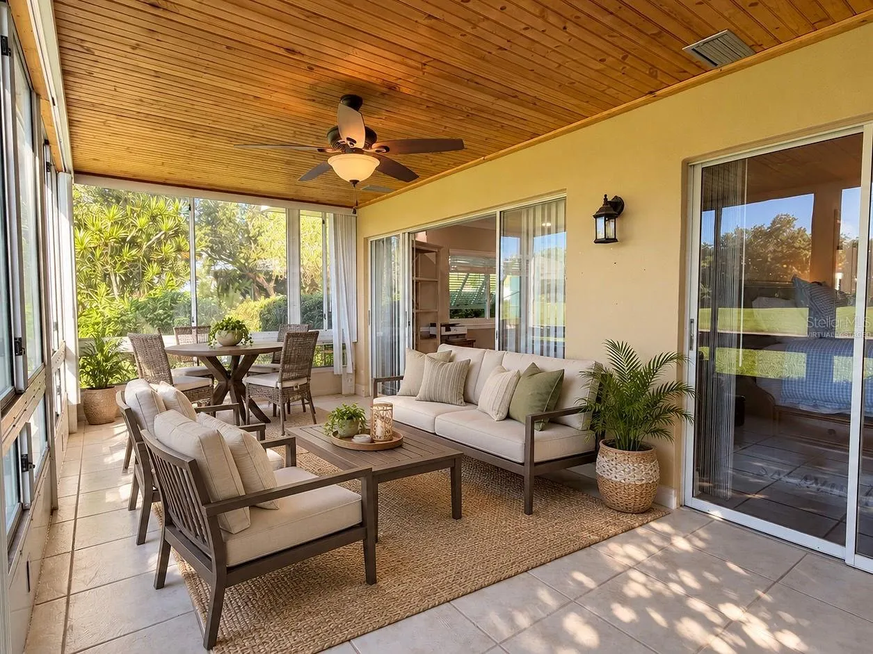 Virtually staged lanai with windows and screens.