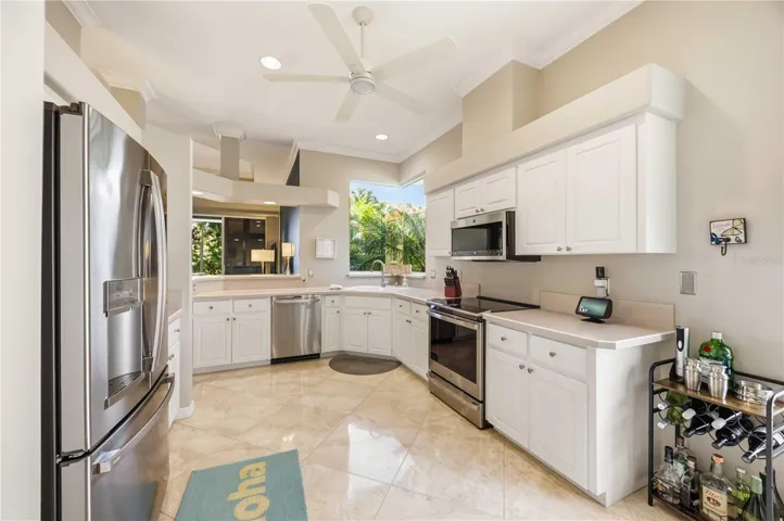 Kitchen has loads of cabinets and all new appliances