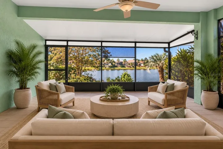 Enclosed lanai with lake view.