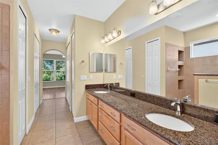 Linen closet and large walk-in closet on the left. Additional spacious closet on the right.