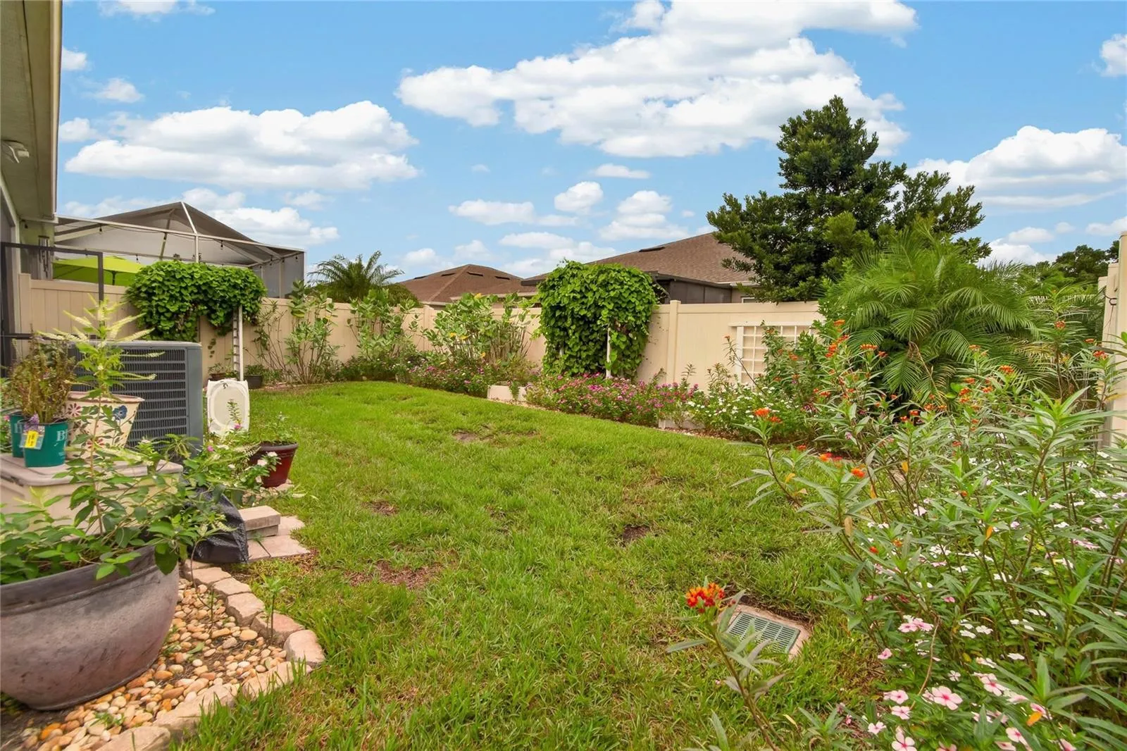 The manageable fenced yard provides genuine outdoor space for pets, gardening and weekend relaxation
