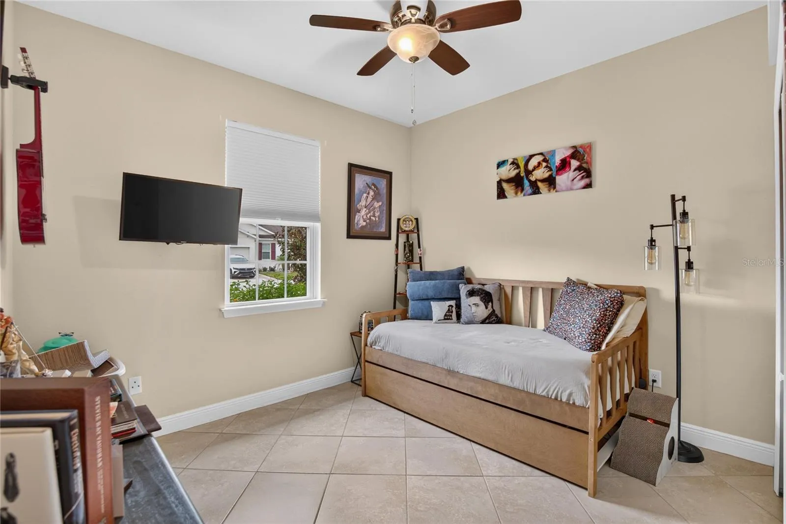 The third bedroom offers natural light, tile flooring and flexibility for guests, hobbies or work from home needs.