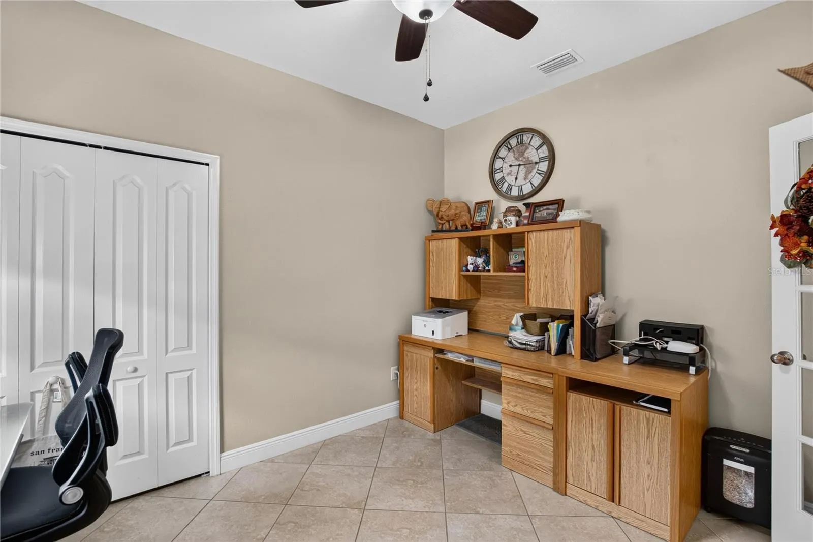 This flexible bedroom is equally ready to serve as a home office, hobby room or comfortable guest space
