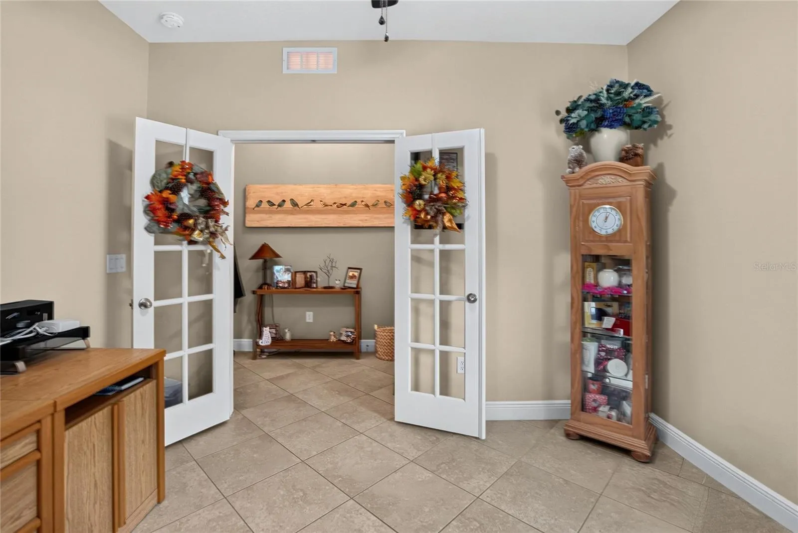 French doors add character and flexibility to this bedroom, office or creative space