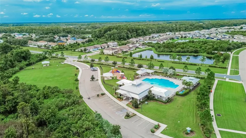 This aerial view places the amenity center within the broader Cypress Preserve neighborhood setting.