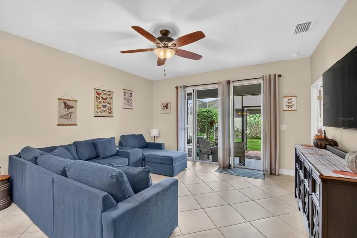 Open the sliding doors and let everyday living flow naturally from the great room to the screened lanai