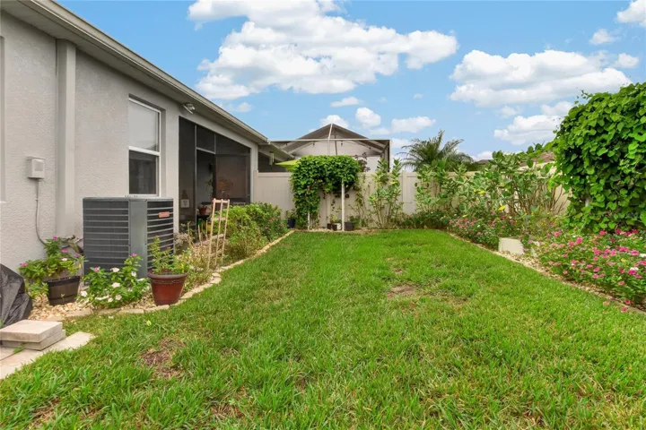 The fenced side yard adds breathing room, usable lawn and another private outdoor area to enjoy