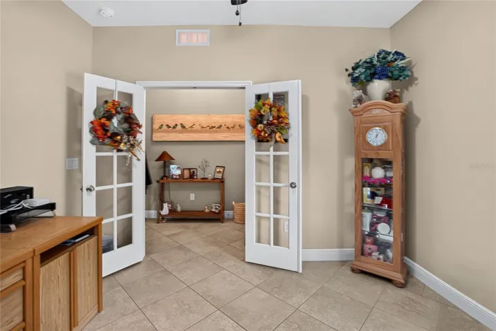 French doors add character and flexibility to this bedroom, office or creative space