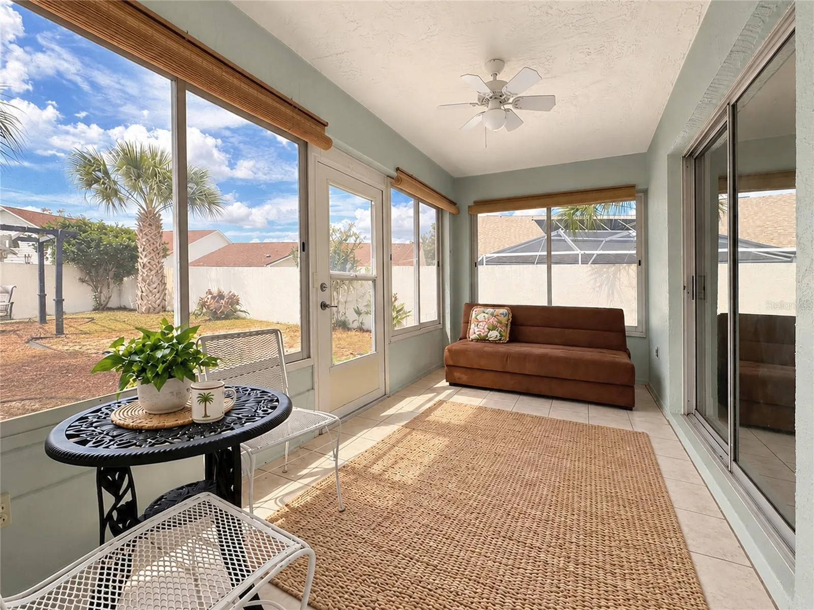 Lanai with sliding windows (floor rug is different)