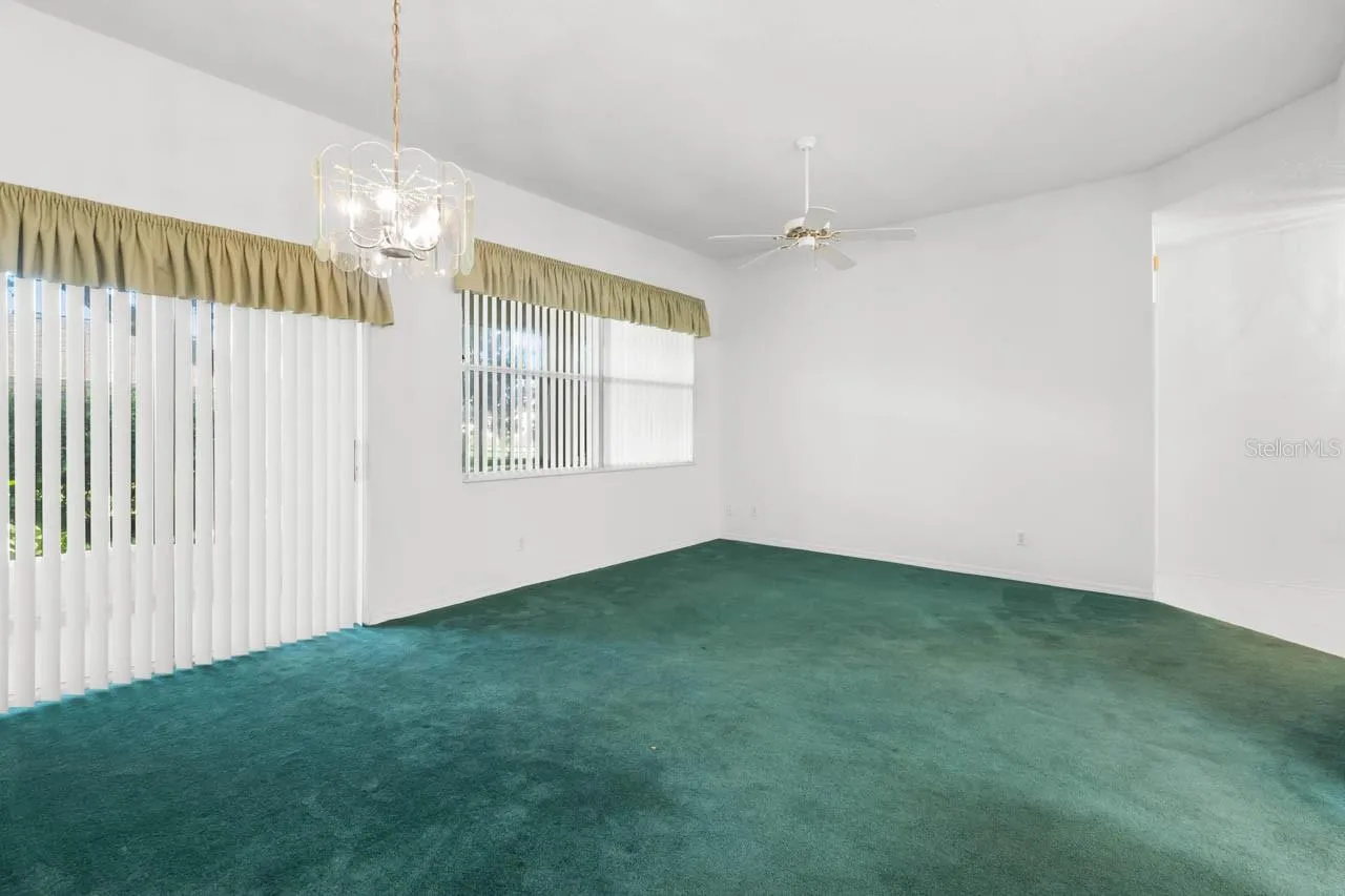 Great room with sliders to the screened lanai