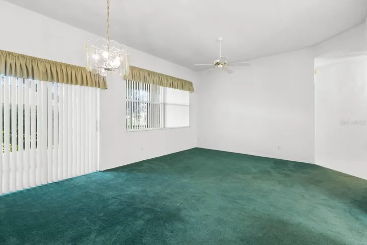Great room with sliders to the screened lanai