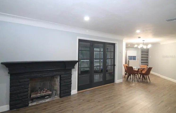 Living Room/ back door / gas fireplace