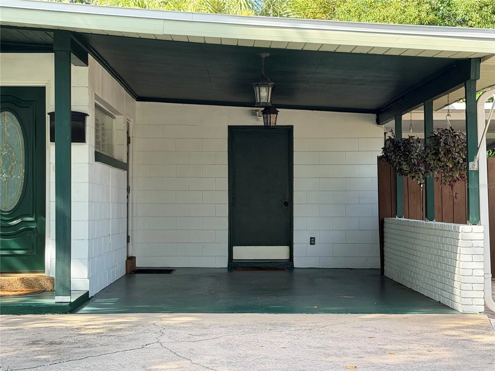 Laundry room door in carport