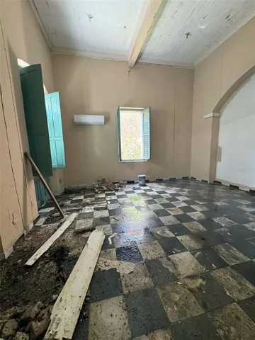Second-floor salon (fire-damaged, needs reconstruction)
