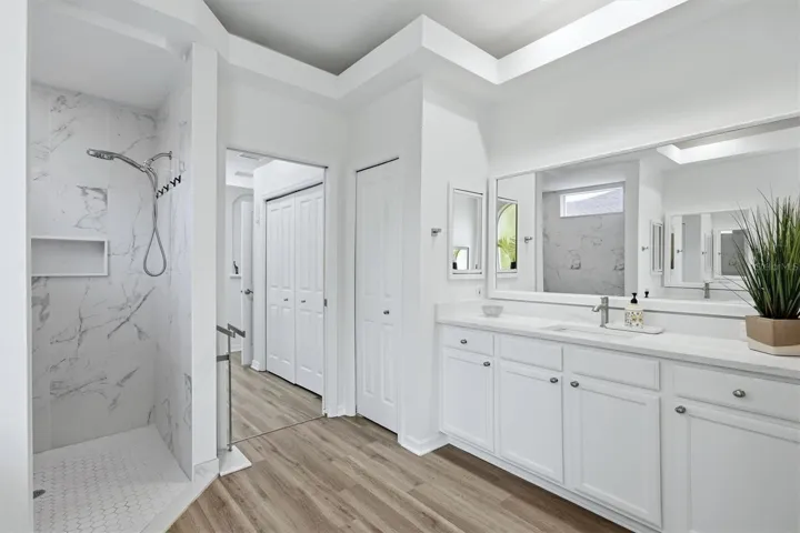 New updated primary bathroom wi5th new shower and countertops