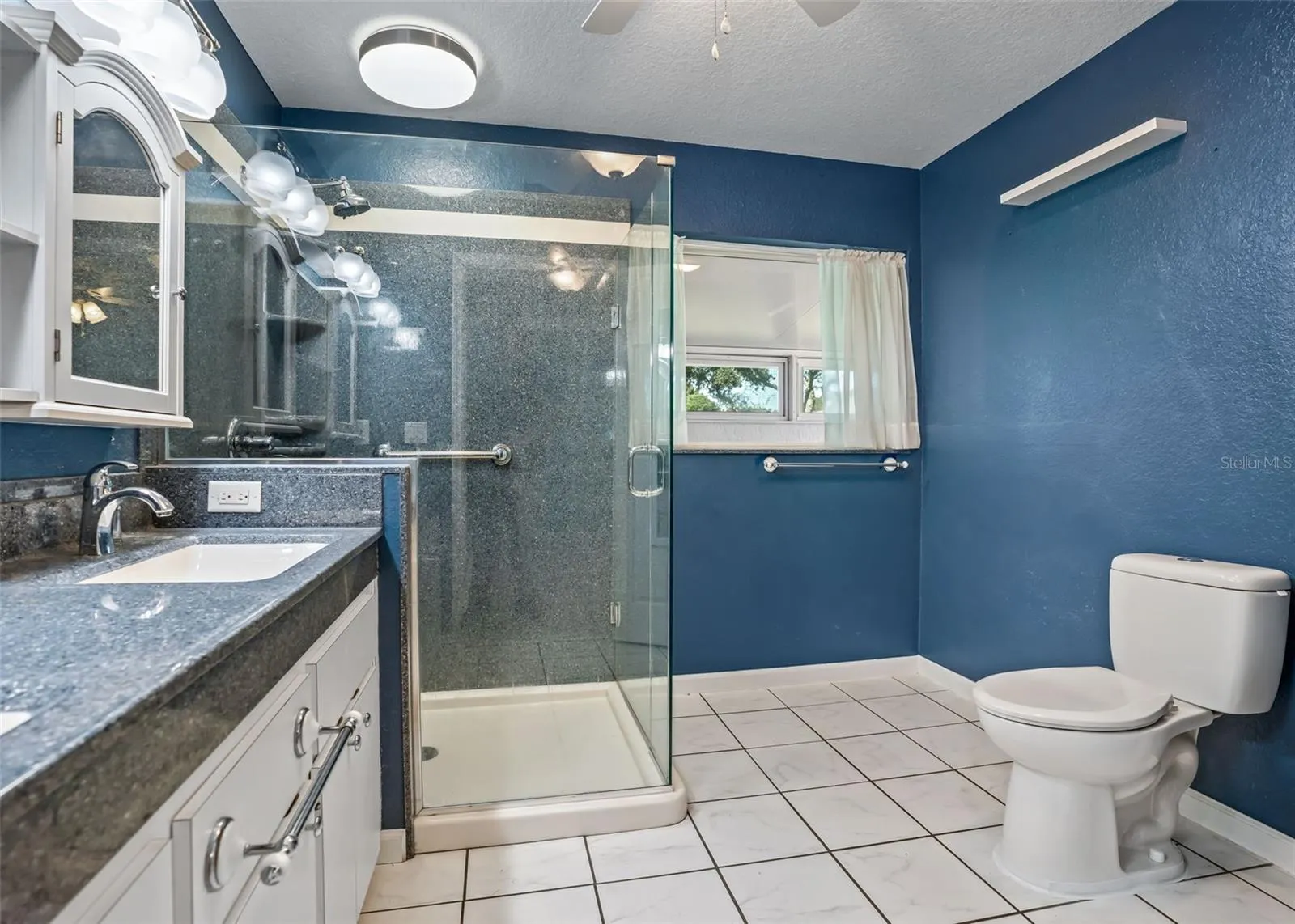 Large Tiled Walk In Shower &amp; High Rise Commode