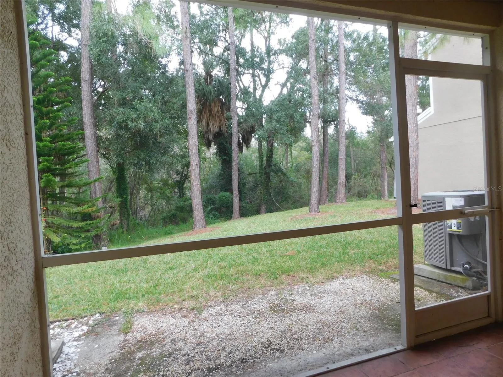 Screened in lanai with conservation views