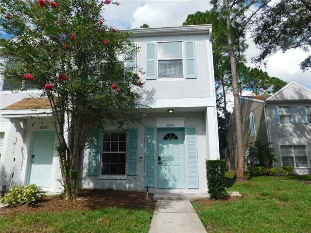 Corner Unit with reserved parking space in front.