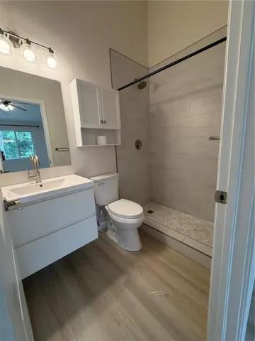 Primary 1 New Remodel Ensuite - Flooring, Shower tiles, Vanity and Faucet, Mirror, Toilet and Light Fixture.