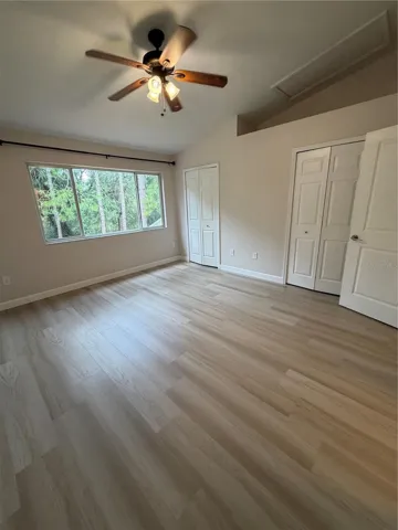 Primary 1  LVP Flooring - conservation view - Dual Closets - Vaulted ceiling - Remodeled adjoining bathroom