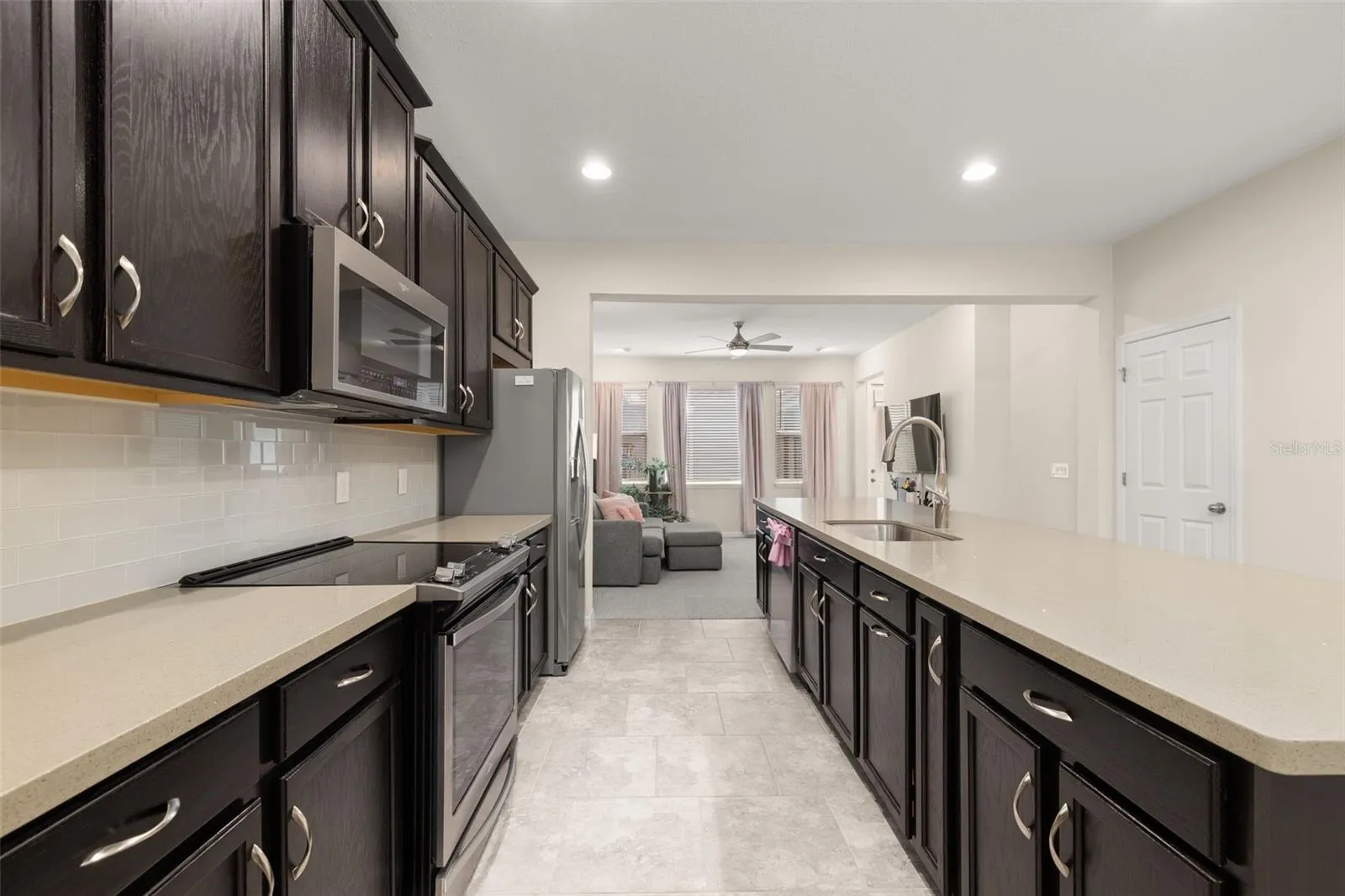 Kitchen loaded with counterspace for food prep and cabinetry for storage