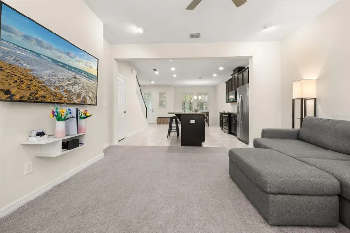 View of the entire downstairs living space from the back of the home
