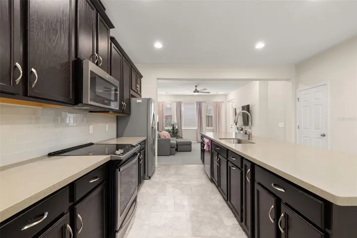Kitchen loaded with counterspace for food prep and cabinetry for storage