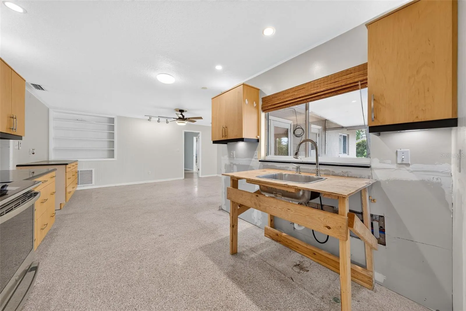 Kitchen - Plumbing leak repaired, cabinets removed. Build your own dream kitchen.