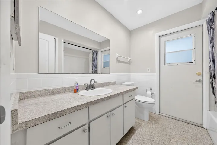 Hall bath leading to pool