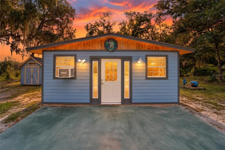 Adorable tiny home nestled on approximately 9 acres of natural Florida beauty.