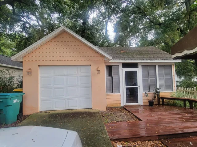 Detached garage with attached room
