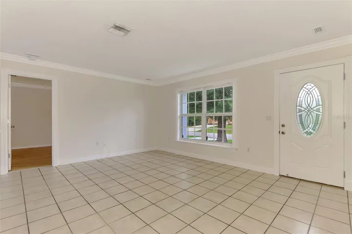 Front entrance and a view to ourside