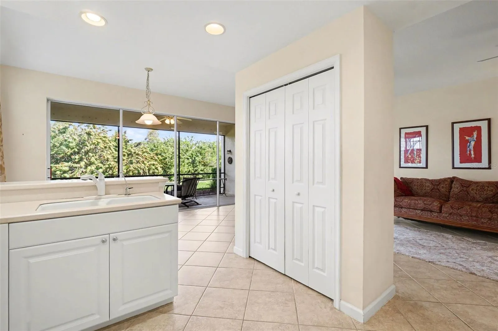 Closet pantry in kitchen provides extra storage!