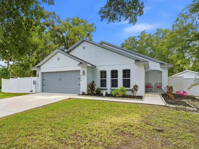 Beautifully remodeled 4/2/2 home in small community.