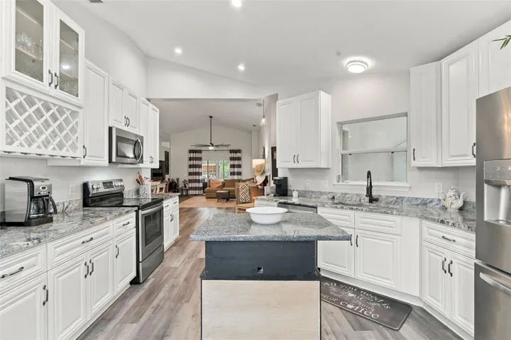Kitchen from front windows. The lighting is beautiful!