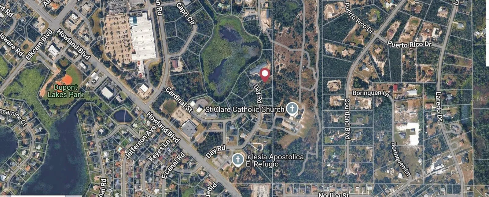 Aerial view of the 2991 Day Road multifamily development site. Property boundary lines are approximate.