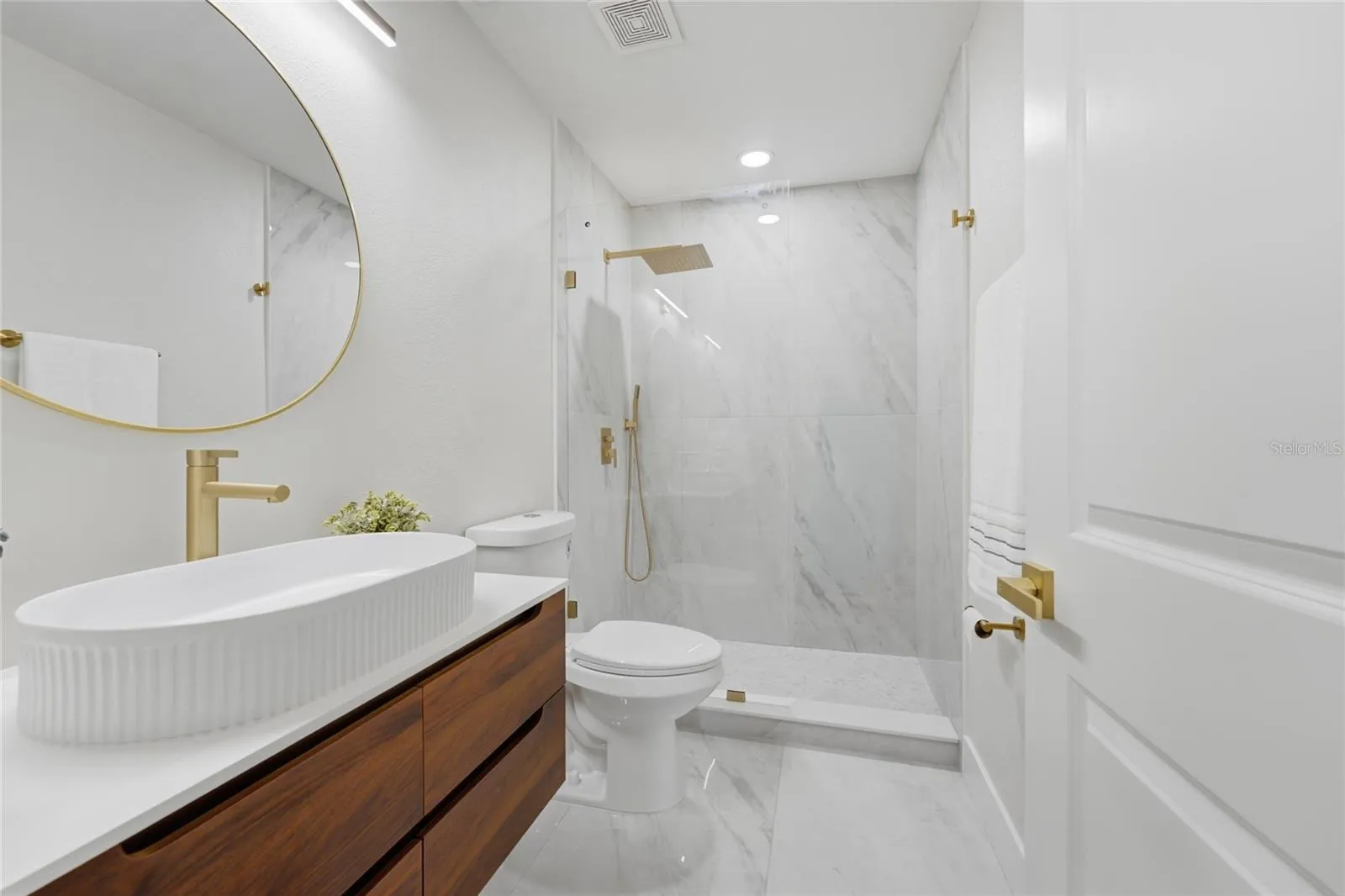 2nd Floor Bathroom including a beautiful oval floating vanity