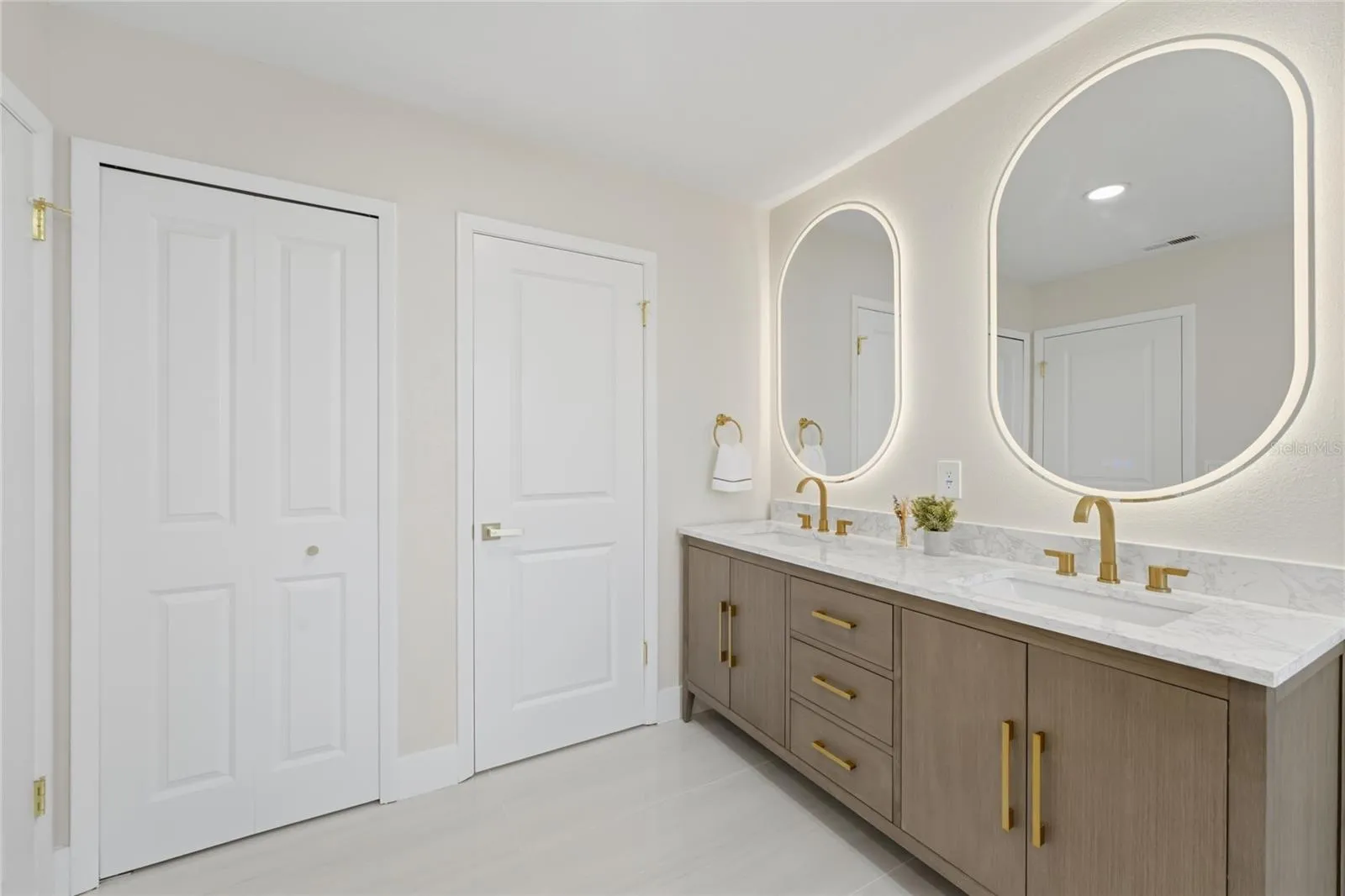 Upgraded frameless LED-lit mirrors