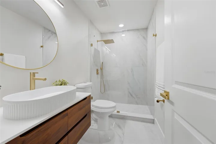 2nd Floor Bathroom including a beautiful oval floating vanity
