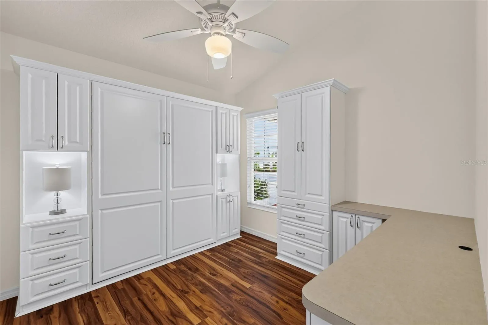 Second Bedroom with Murphy Bed, Custom Cabinetry, and Built-In Desk