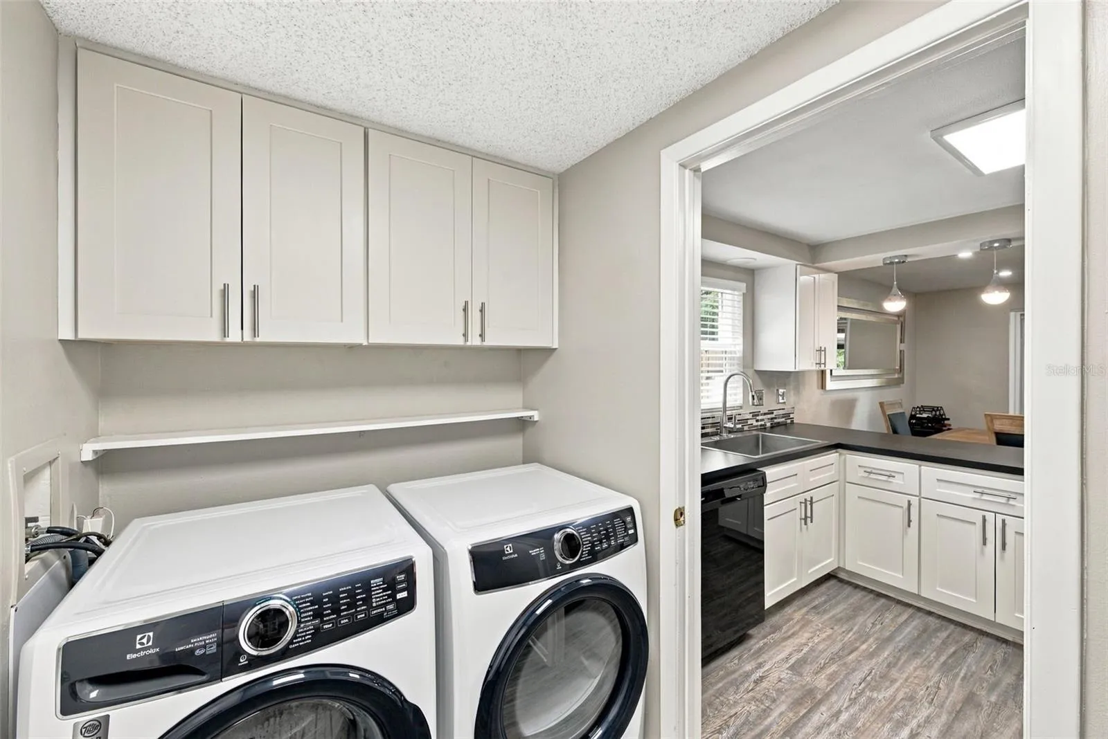 Laundry room to kitchen view