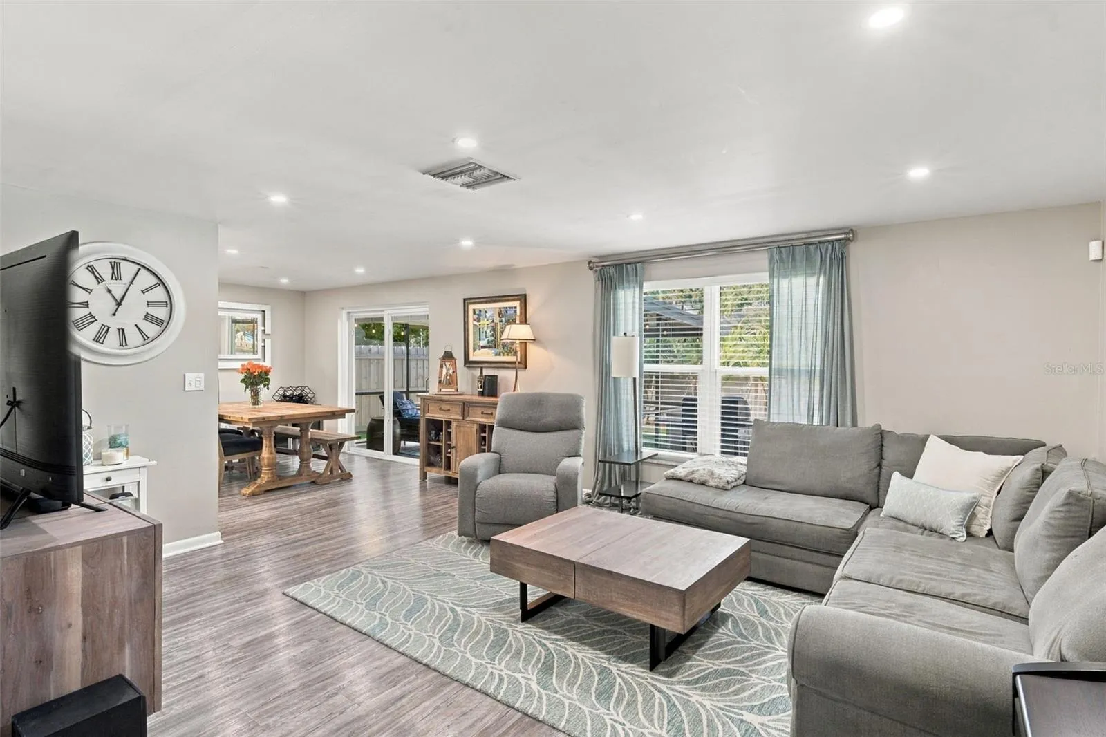 Living room - 2022 Lux. vinyl flooring, new lighting