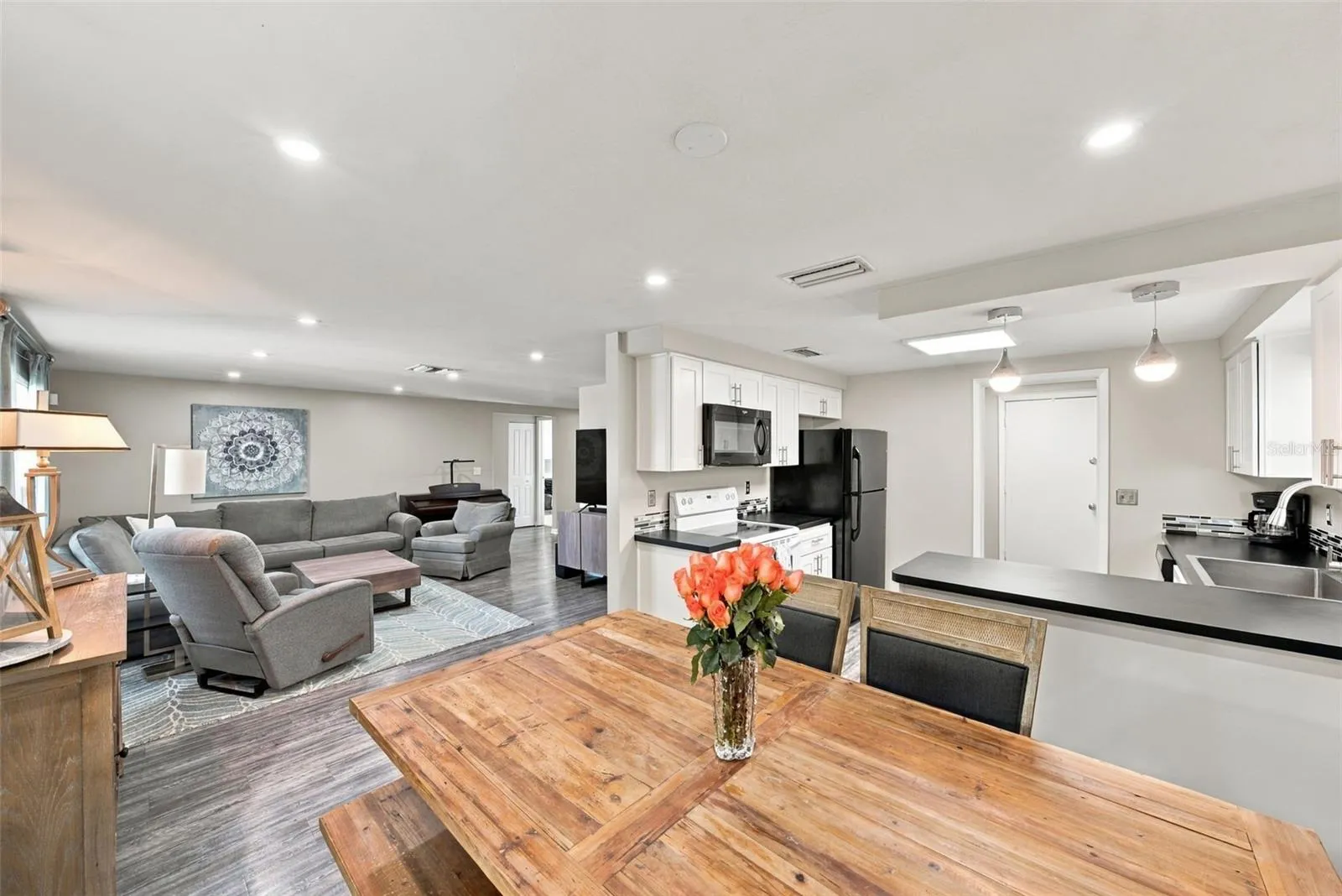 OPEN FLOOR PLAN - Dining room, kitchen and living room