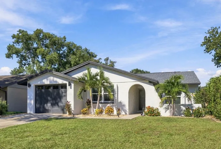 Beautifully UPGRADED 3 BR/2 BA/1-car Garage home - 2024 ROOF, 2023 HVAC, 2022 hurr-rated windows, garage door and sliders and more!