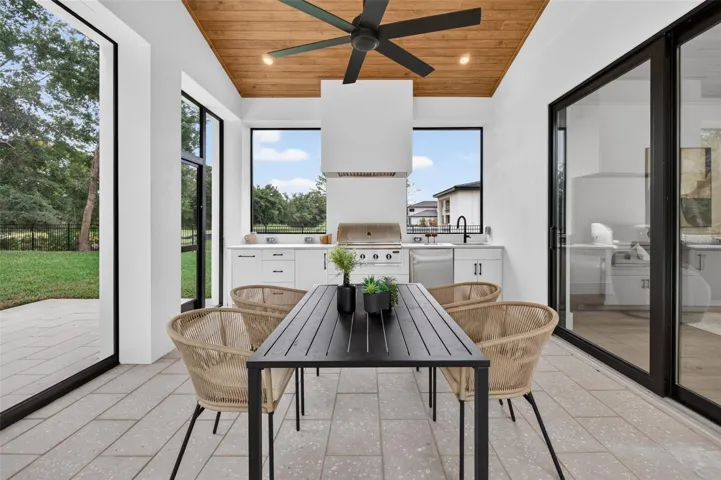 Covered lanai with motorized retractable screens
