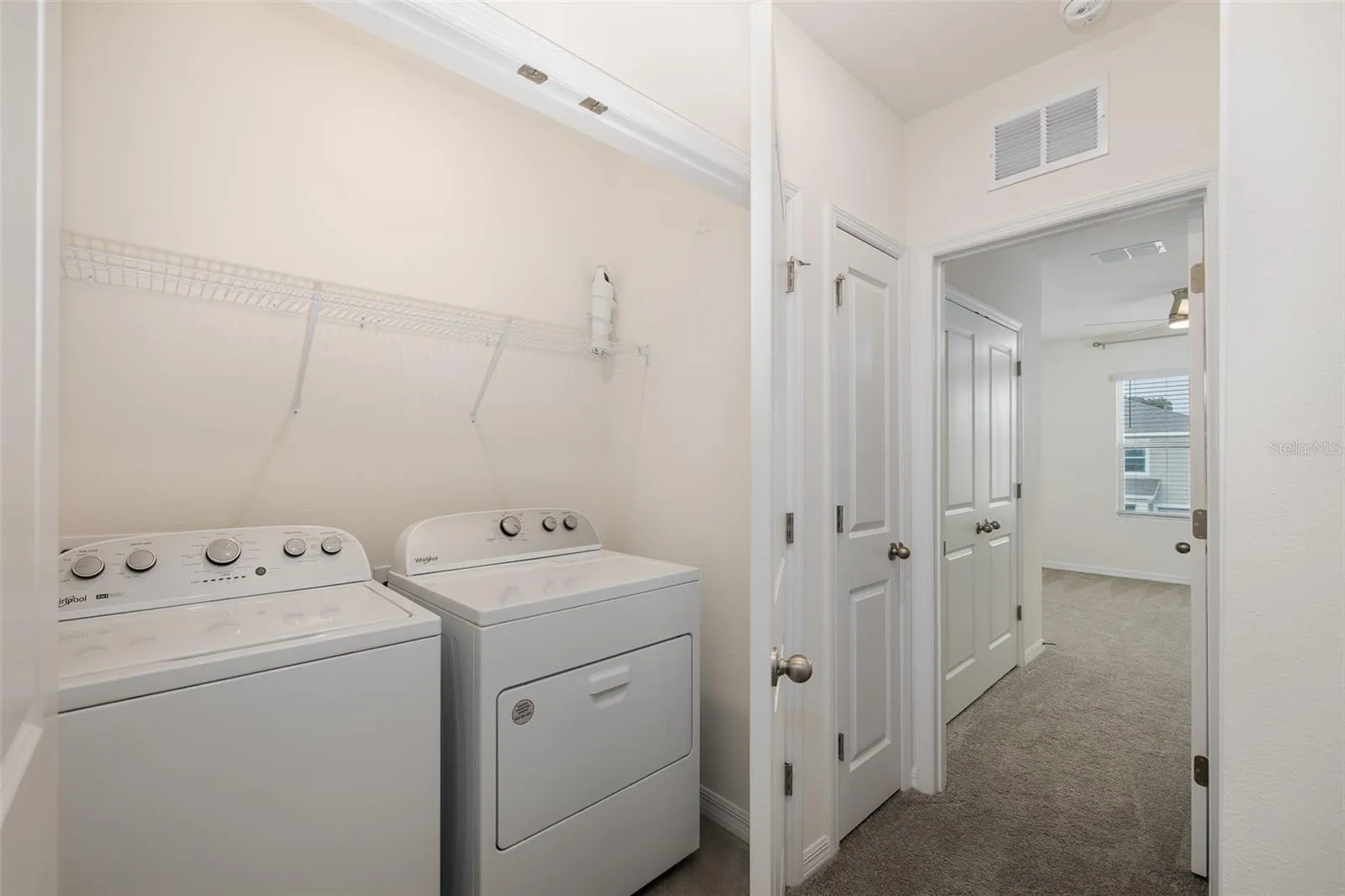 Laundry area upstairs with quick access to bedrooms
